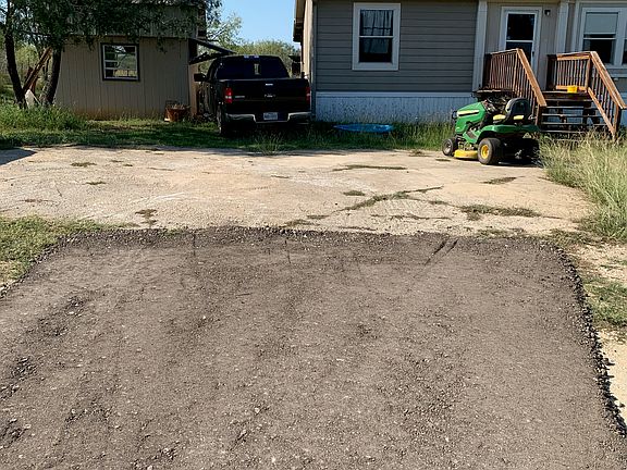 Top of driveway close to house