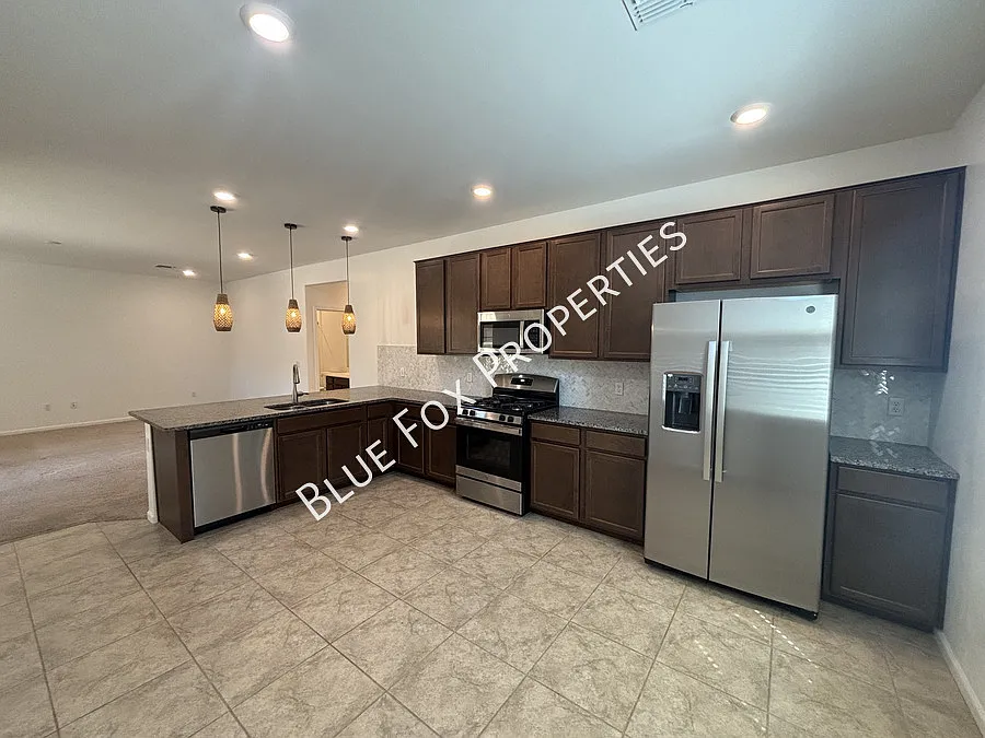 Building Photo - 7095 W Jadewood Ln