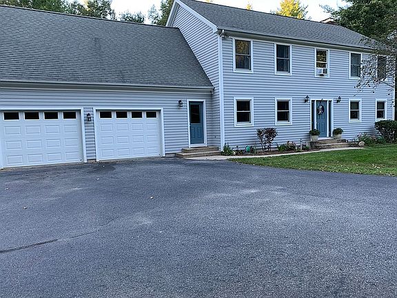 Front w/ 2 Car Garage