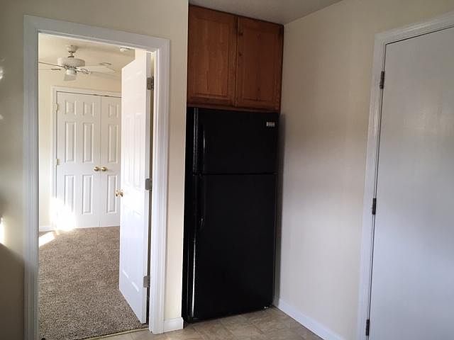 Kitchen, entry to Bedroom 1 (closet in view)
