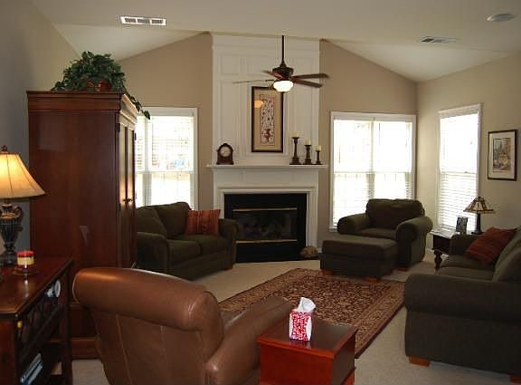 Family Room has Vaulted Ceiling, Fireplace w/Gas Logs, and Surround Sound
