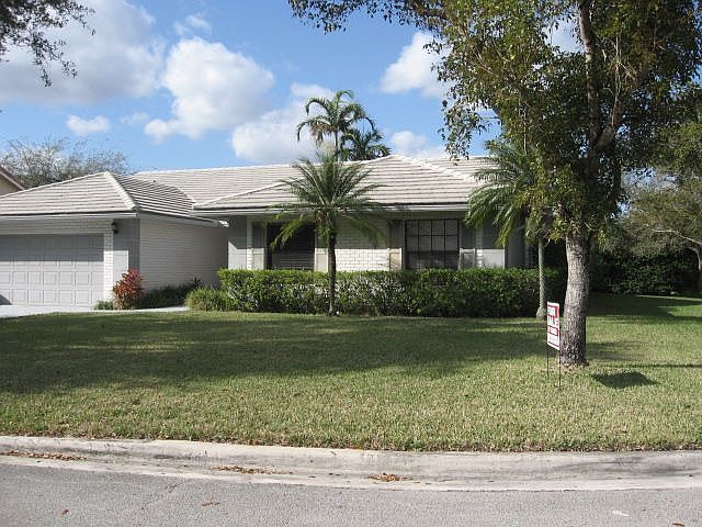 House sits on corner in quite neighborhood