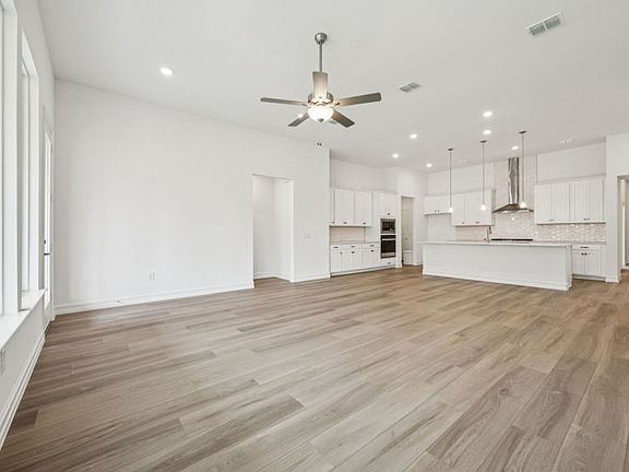View of kitchen from gathering room photos may depict options and features that aren t available