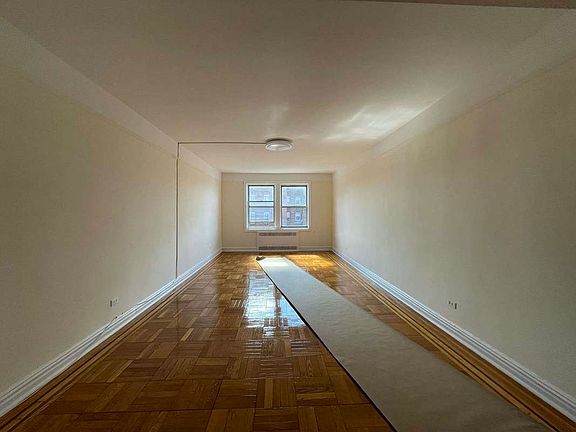 4th image of 64-48 Booth St #44