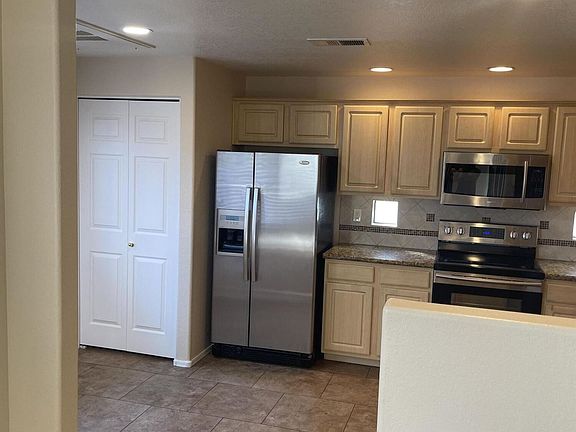 4th image of 9555 E Raintree Dr NE #1018