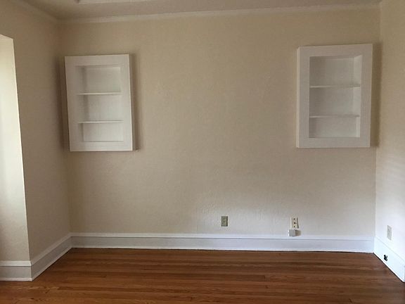 Living room with built- in book cases.