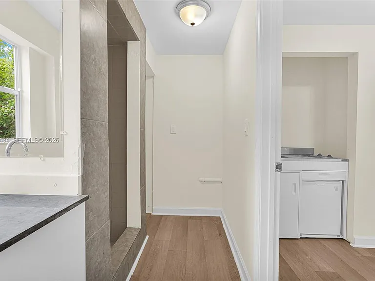 299 NW 43rd St — Photo 3