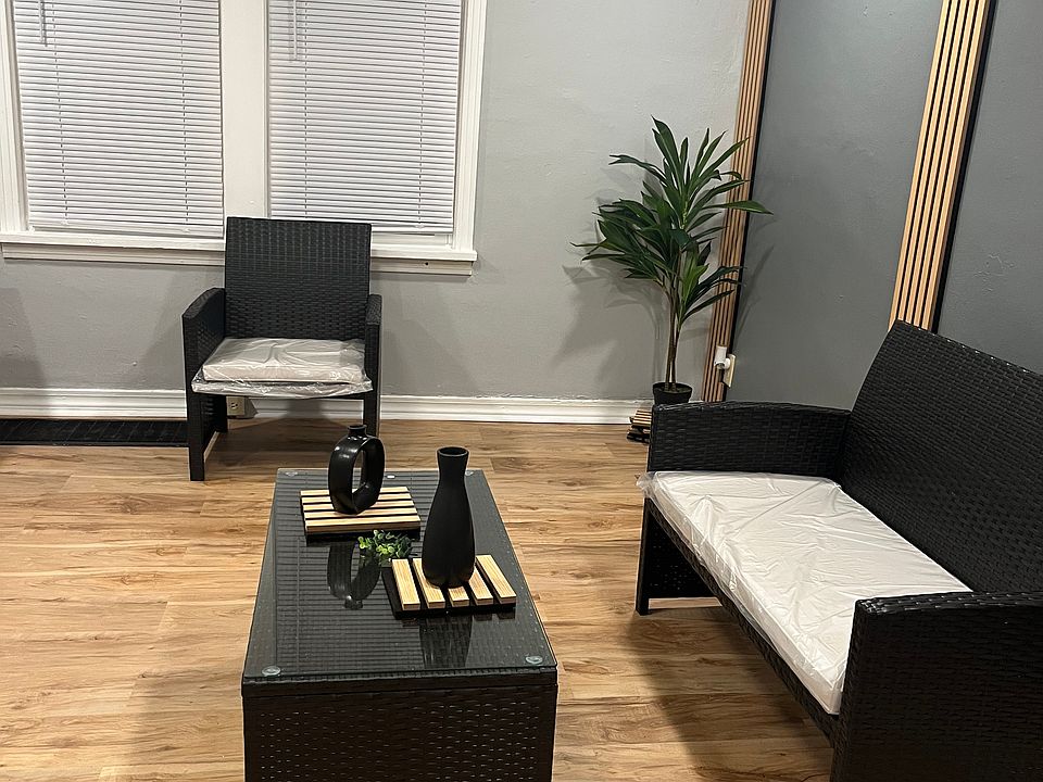 renovated living room with new windows throughout entire home!