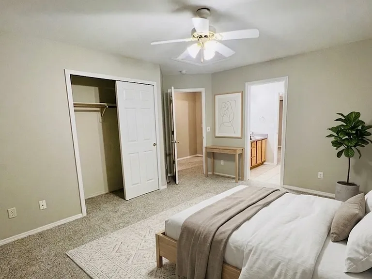 Second upstairs bedroom, virtually staged to show possible furniture placement