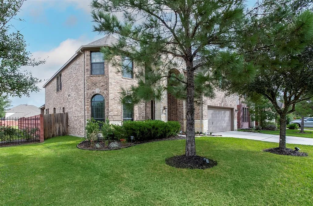 Front of the house. Corner lot next to community gate. - 20222 Rusty Rock Ln