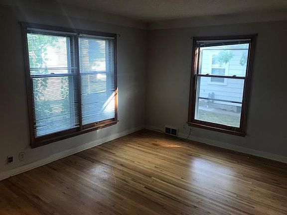 5918 Living Room with lots of windows to welcome the morning sun!
