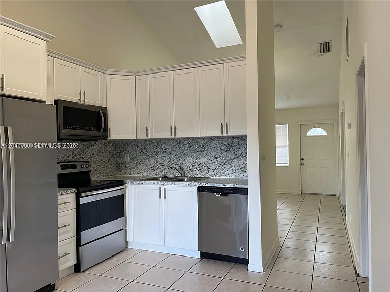 7321 Tam Oshanter Blvd — Photo 5