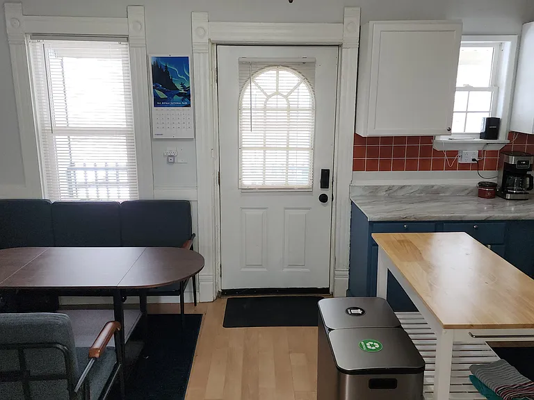 Door leading to private back porch as well as backyard is thru the kitchen.
