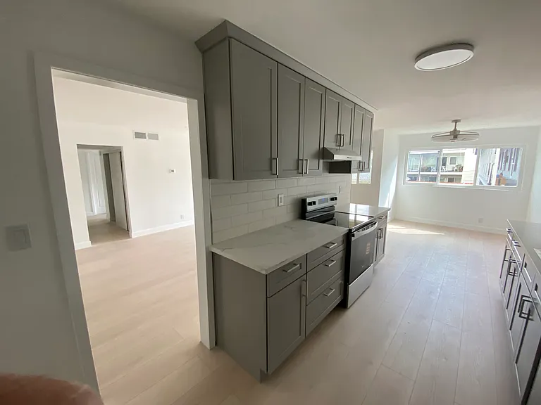Kitchen facing Dining Room & Living Room