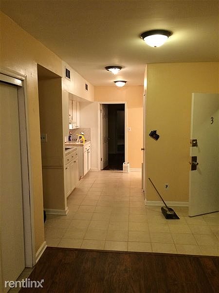 View from Living Room into Kitchen, toward Master Bedroom