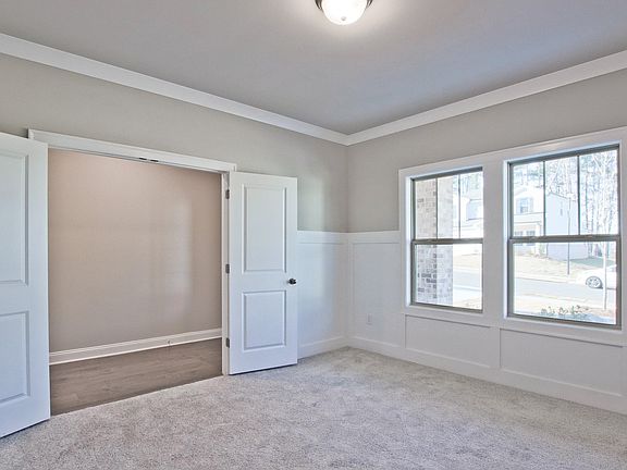 Versatile flex space can be used as an office or dining room.