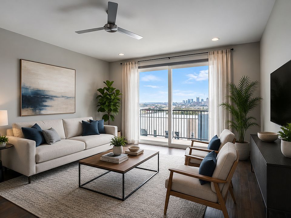 3rd floor living room with downtown views
