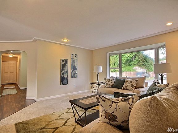 Sizeable Living Room connects with the dining area for inclusive gatherings.
