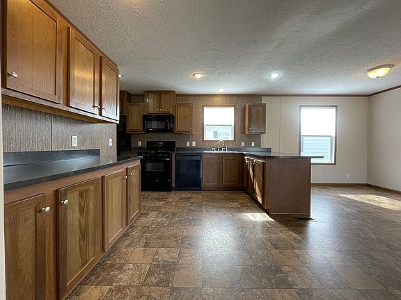 4th image of 7204 E Grand River Ave #36-036