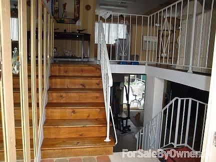 The view when you come in the front door. You can go upstairs or downstairs.