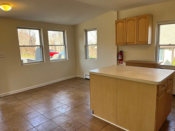 Open concept kitchen with nice size central island (Continued)