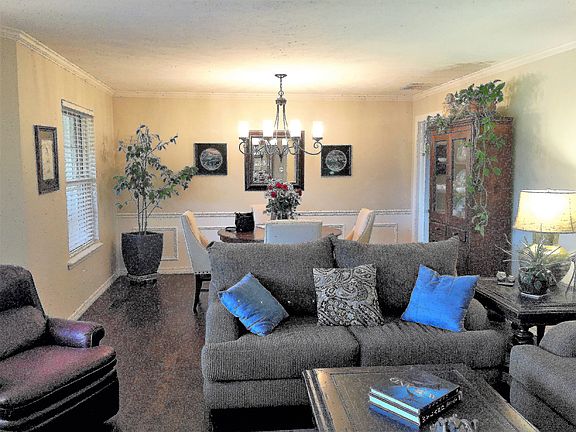 Wood floors, open to dining