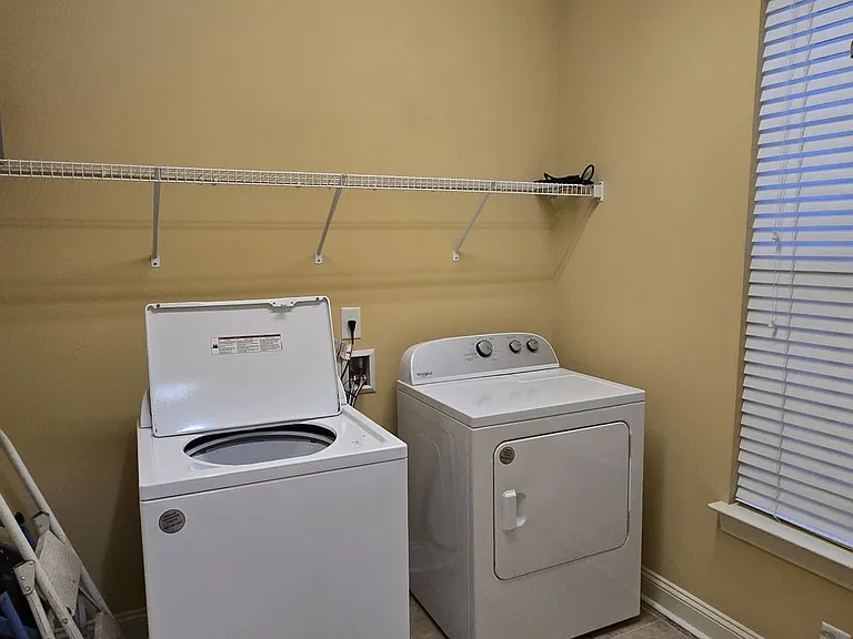 Large laundry room with washer & dryer