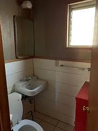 HALF BATH OFF OF BEDROOM 3