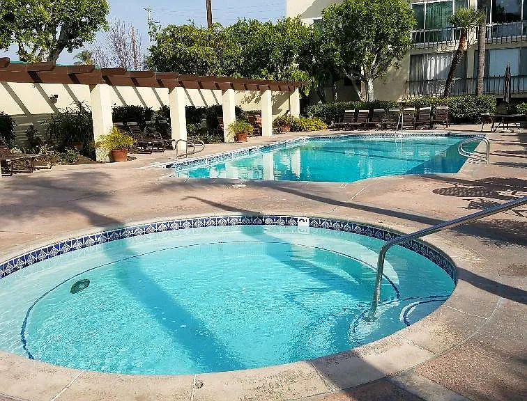Heated jacuzzi near pool