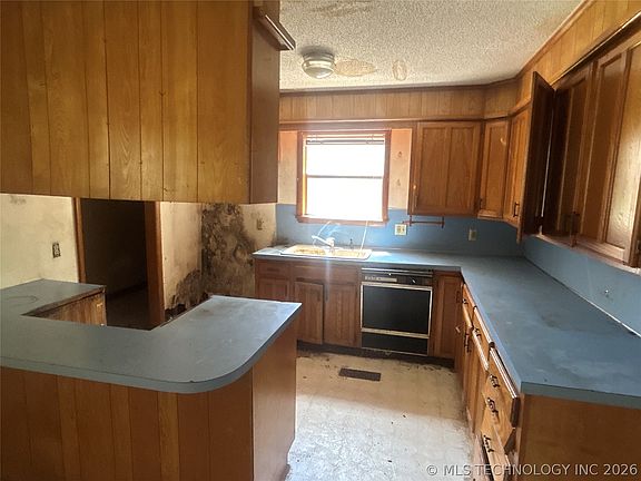 3rd image of 9067 E 33rd St