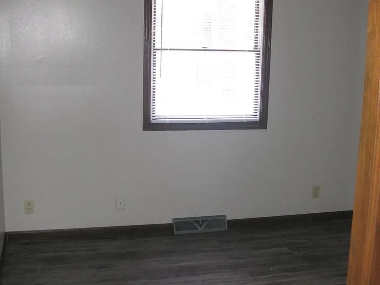 Bedroom with new paint and flooring