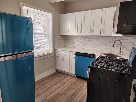 New cabinet, new stainless steel appliances