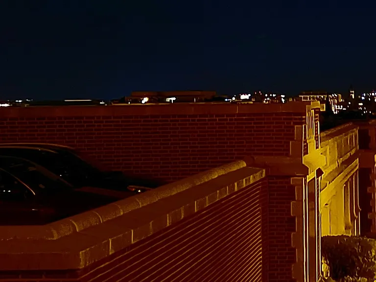 Night view of downtown DC down 13th St hill, just 5 min walk from apt. Capitol on left, Washington Monument on right.