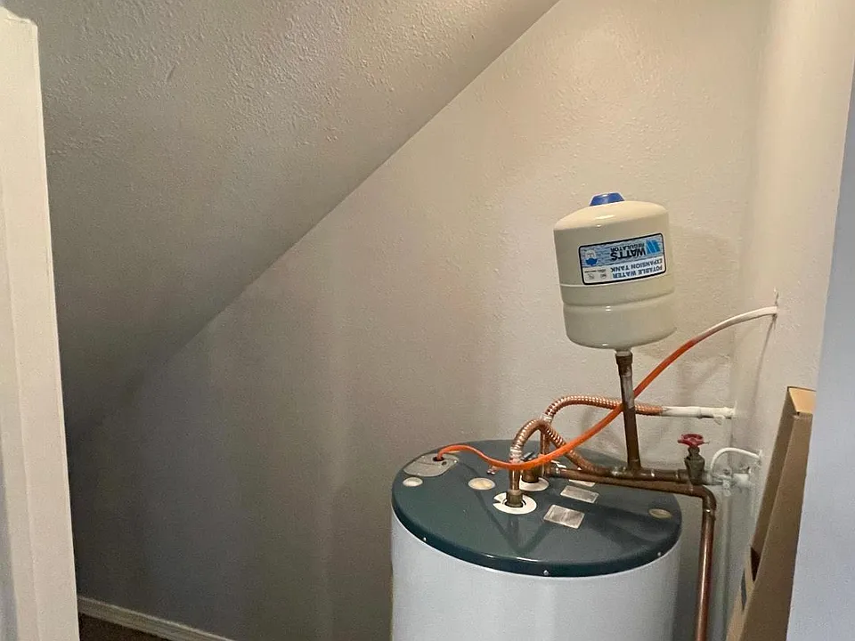 Storage under the stairs.