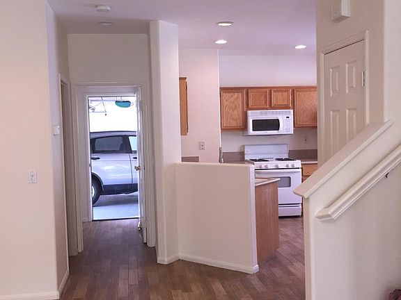 Kitchen and peek of garage