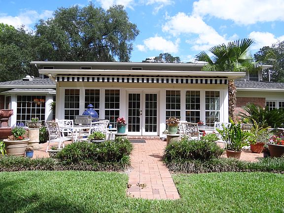 Sun Room with Brick Patio