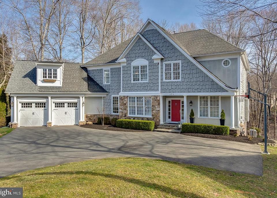 2 car garage with parking area on right