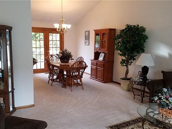 Brand new carpeting throughout the first floor which features living, dining and kitchen with vaulted ceilings.