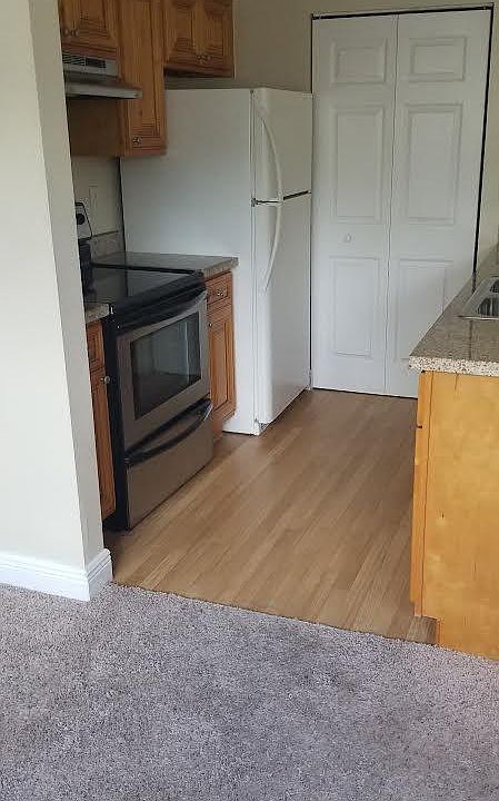 kitchen (door in the back leads to washer/dryer hookups))
