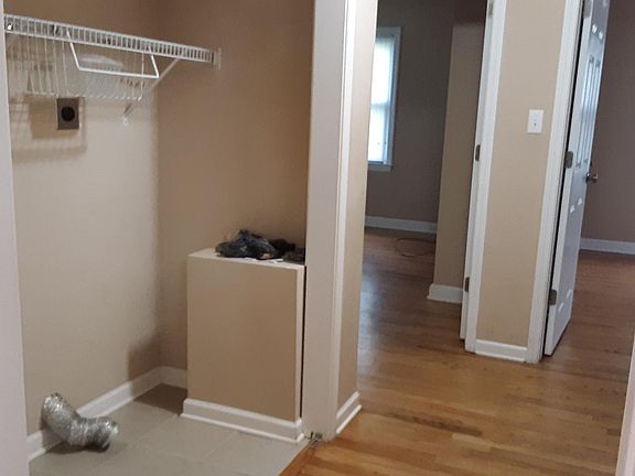 hallway laundry area to bedrooms
