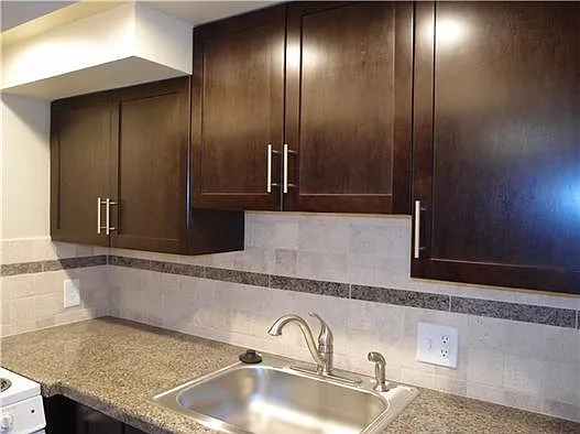 kitchen cabinets and granite countertop