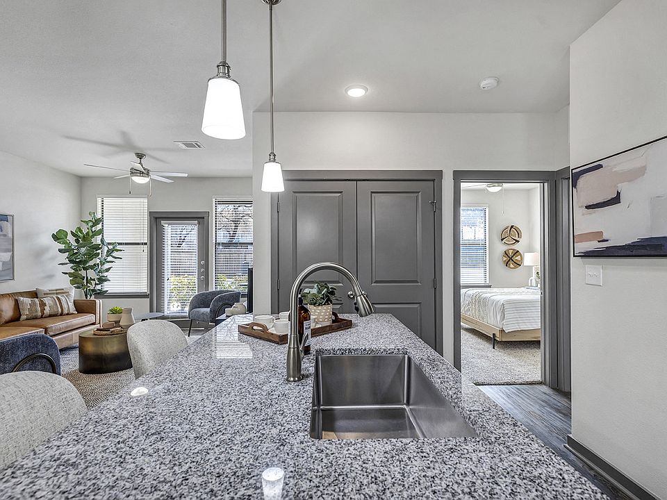High ceilings and tall windows bring in natural light to fill your home.