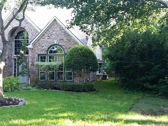 Front right w/ wooded creek