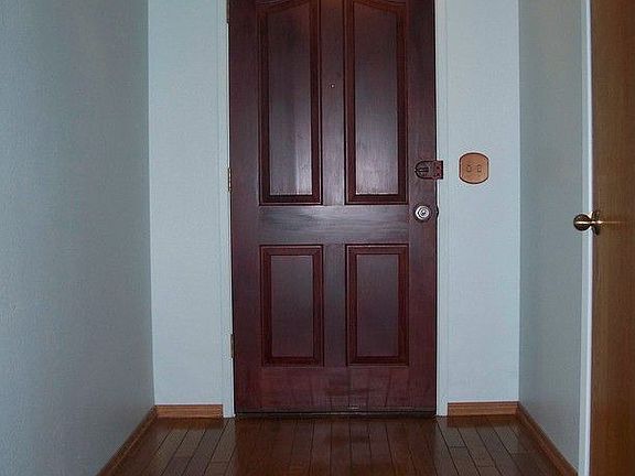entry way with hardwood flooring