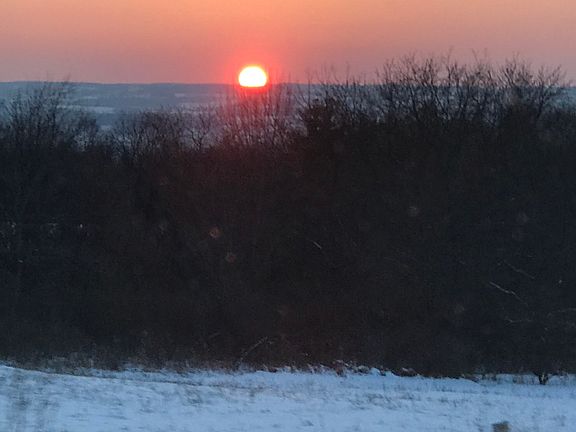 Winter sunset from field