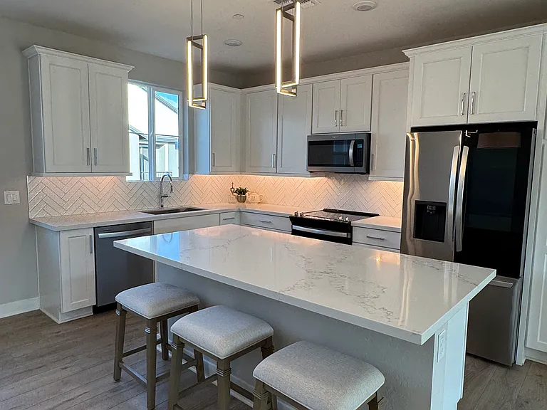 Quartz countertops and designer lighting