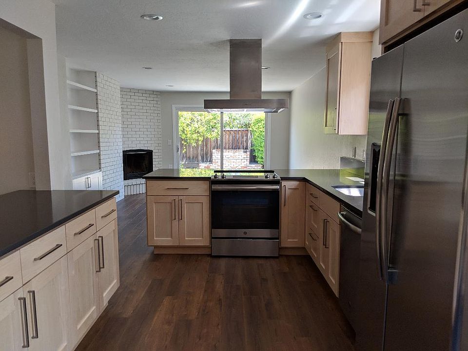 Kitchen and Family Room with fireplace