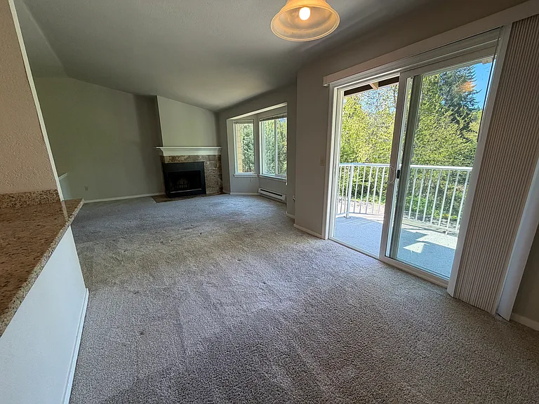 looking to living room fireplace from dining room