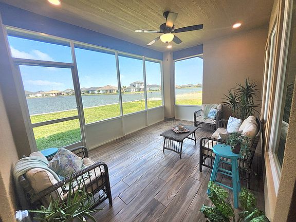 Comfortable patio area with beautiful Lake and sunrise views