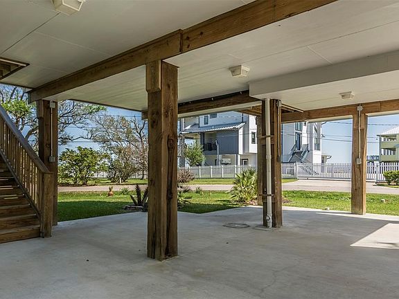 Plenty of shade and room under the house for outside activities and partying.